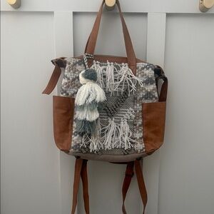 Chic Woven Backpack with Tassel Accent